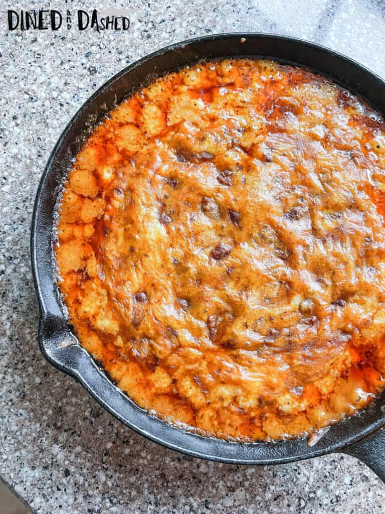 skillet queso recipe in a cast iron pan