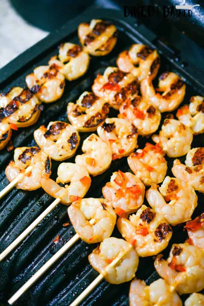 keto shrimp with red peppers on a grill